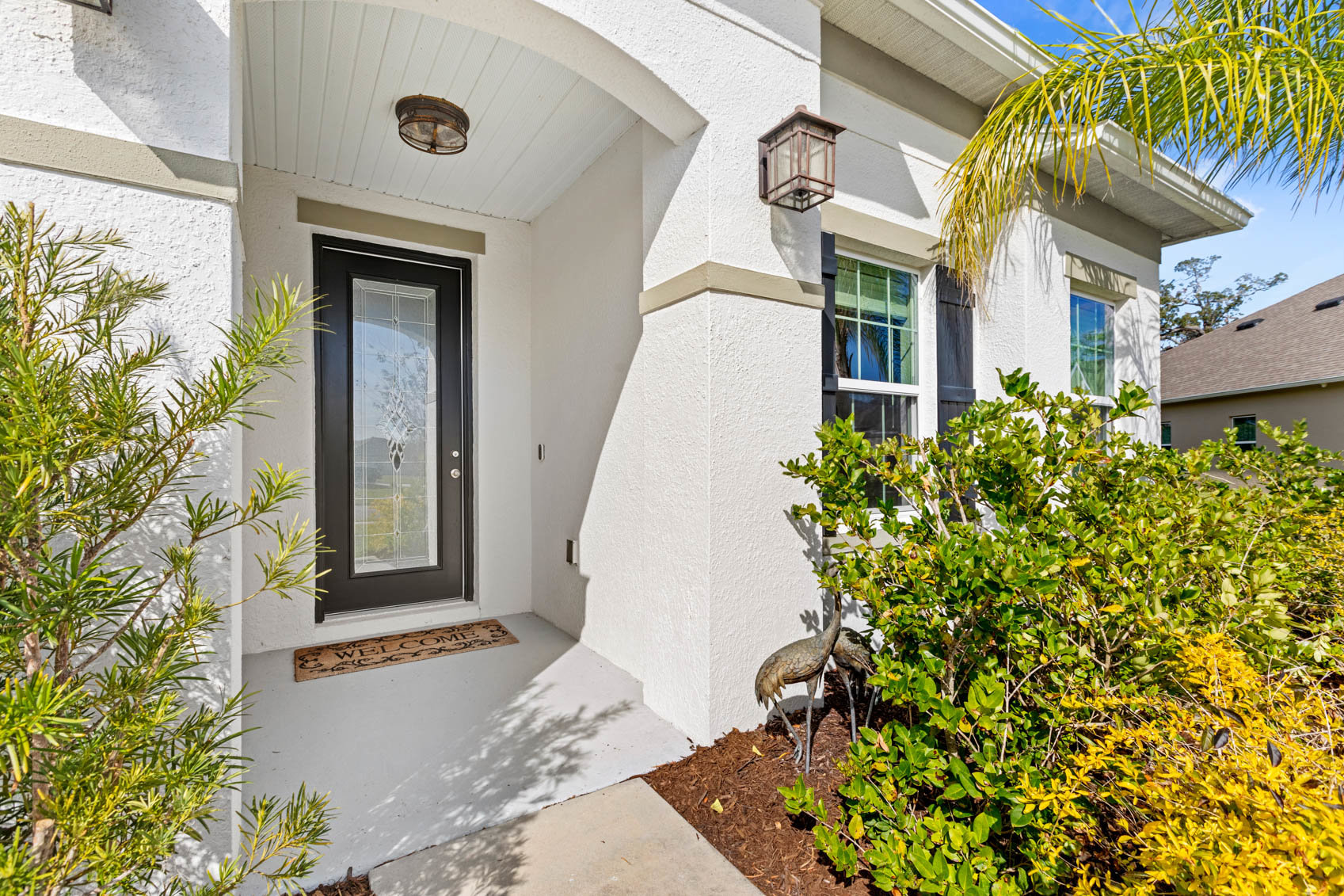 outside front door entrance with glass door
